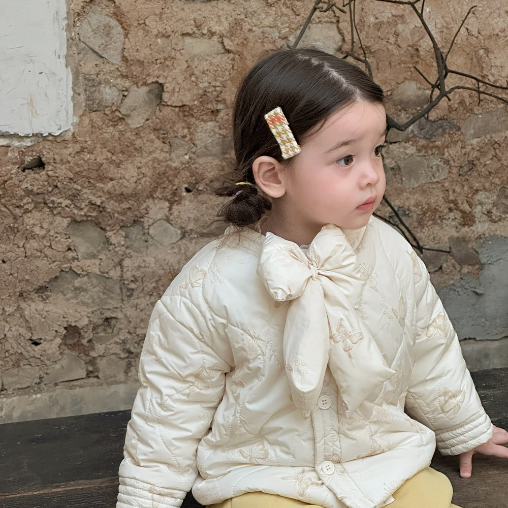 Vestido de un año de niña de estilo chino nuevo rosa, mujer bebé otoño e invierno acolchado grueso de manga larga chaqueta de algodón con lazo grande