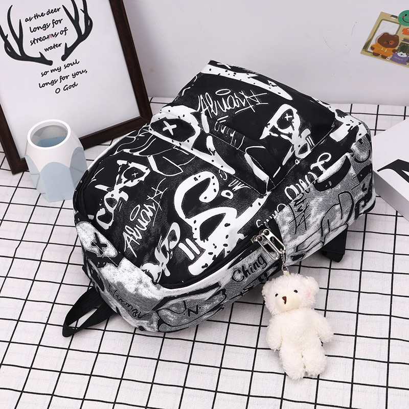Nuevo estudiante de secundaria mochila personalizada carta graffiti mochila pareja de gran capacidad mochila bolso de viaje moda