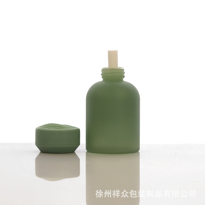 Botella de fragancia de vidrio cilíndrico verde, botella de fragancia vacía sin fuego, botella de fragancia