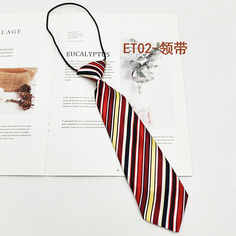 Spot de fábrica al por mayor conjunto de pajarita de corbata para niños de escuela primaria, corbata a rayas de color sólido, pajarita de raíz de plumas