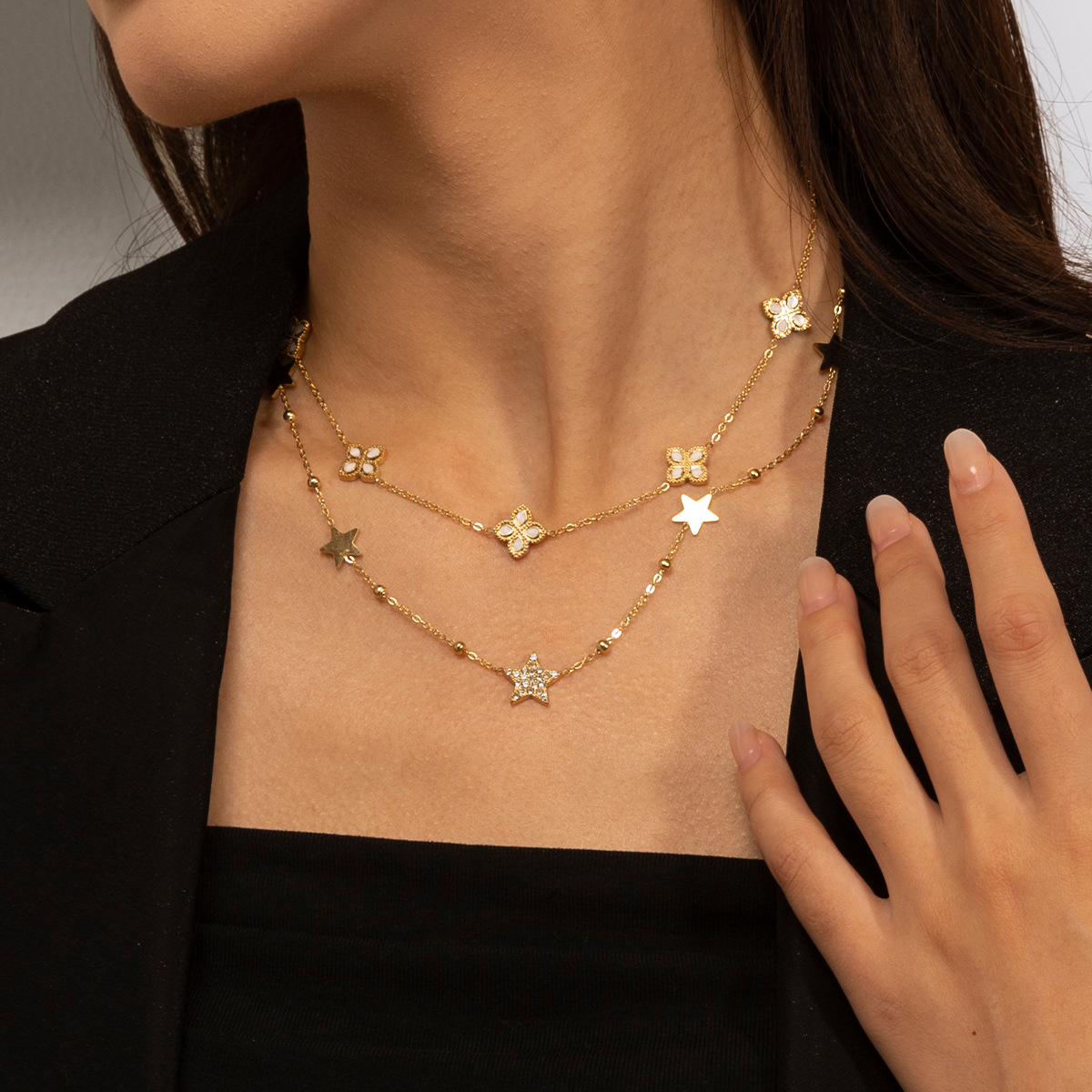 Collar de acero inoxidable de lujo ligero de alto nivel floral collar de estrellas pulsera conjunto de joyas no se desvanece