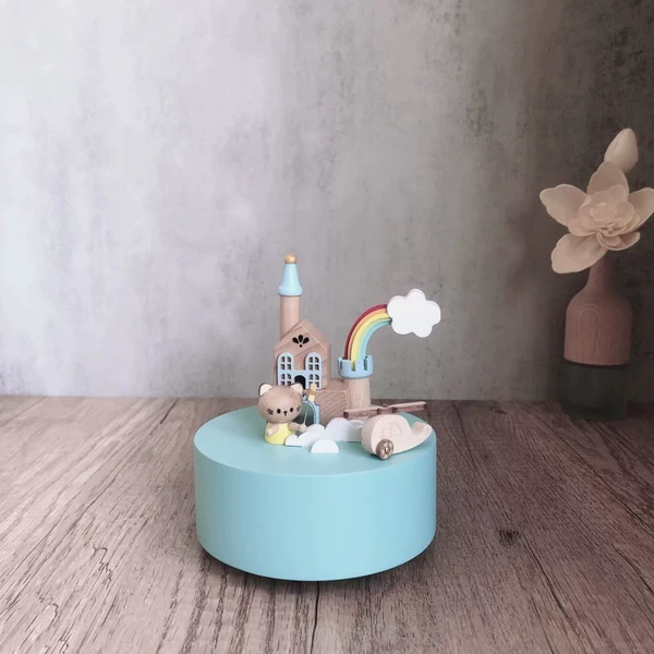 Music box, blue airplane, kitten