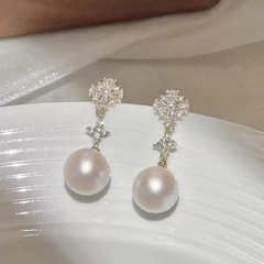 軽豪華高級感ジルコン流蘇イヤリング女性大衆デザイン百合真珠花ピアスシンプル気質耳飾り