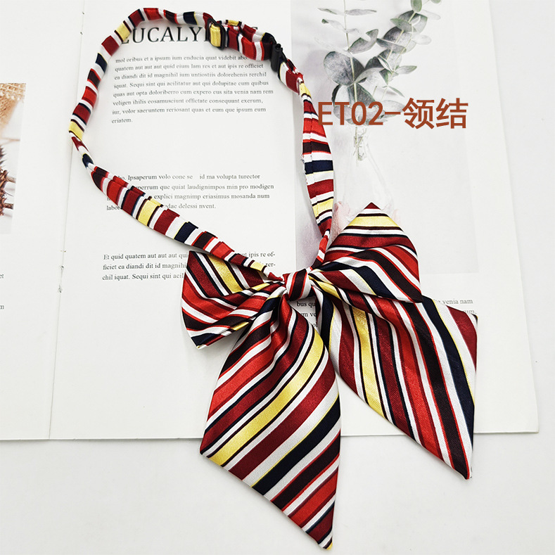 Spot de fábrica al por mayor conjunto de pajarita de corbata para niños de escuela primaria, corbata a rayas de color sólido, pajarita de raíz de plumas
