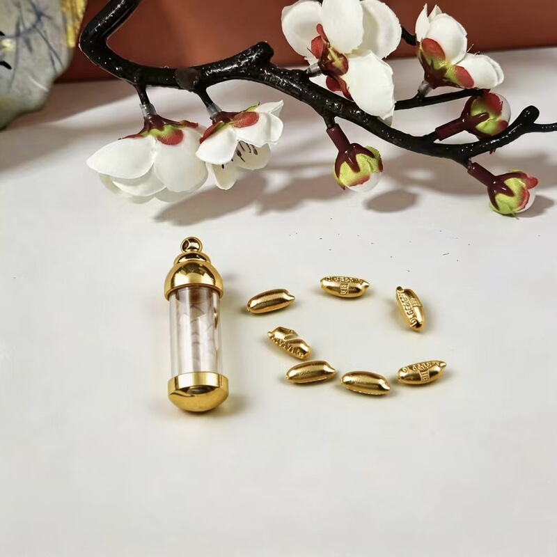Brass Waterproof Seven-Grain Rice-Shaped Pendant Necklace Transparent Pendant Keychain Openable Hollow Pendant Necklace Wholesale Brass Waterproof Seven-Grain Rice-Shaped Pendant Necklace Transparent Pendant Keychain Openable Hollow Pendant Necklace Wholesale