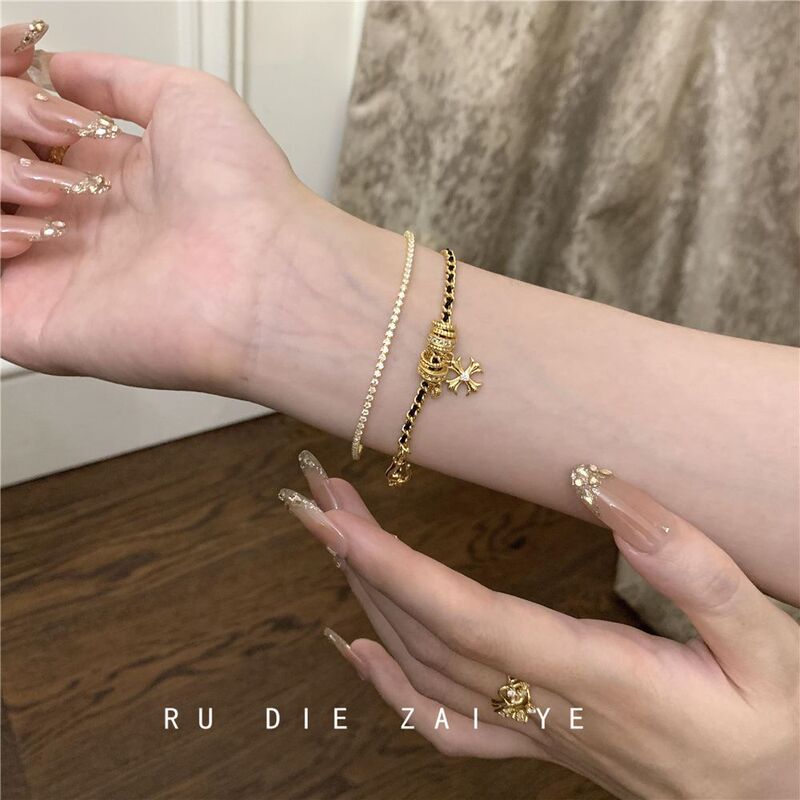 Kuining Vintage Chanel-Style Black Gold Cross Zircon Bracelet with a Luxurious Feel, Light Luxury High-End Woven Hand Accessory
