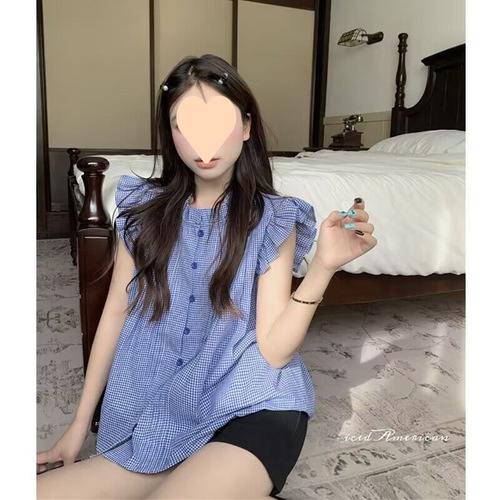 French-inspired, sweetly chic petite fly-sleeve blue plaid shirt for women—summer, retro, and uniquely designed with delicate ruffled edges and a sleeveless top.