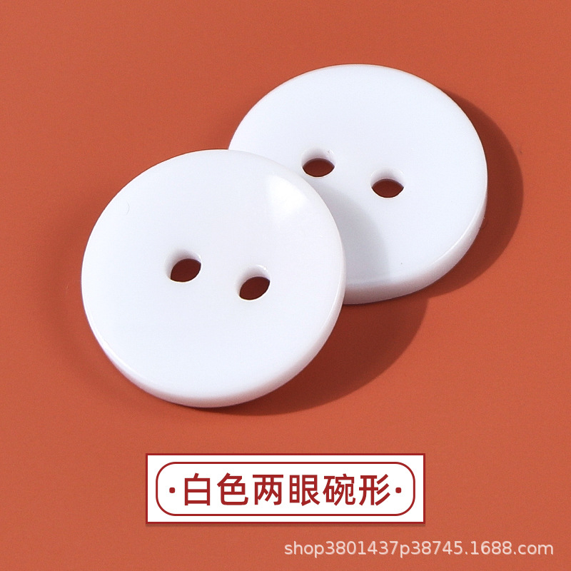 Botón de pan de cuatro ojos Camisa blanca y negra Cortavientos Botón de resina Botón de resina de dos ojos Botón de pan de cuatro ojos con borde fino transparente