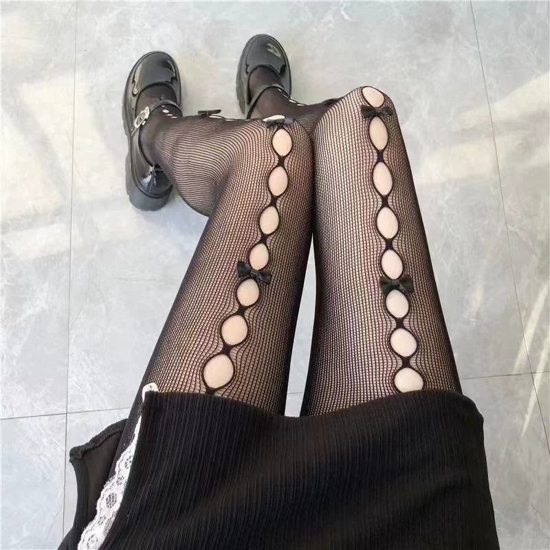 Тайм/ Tide? Однако исходный текст: "Tide, summer lace tights, black fishing net with bow". 
