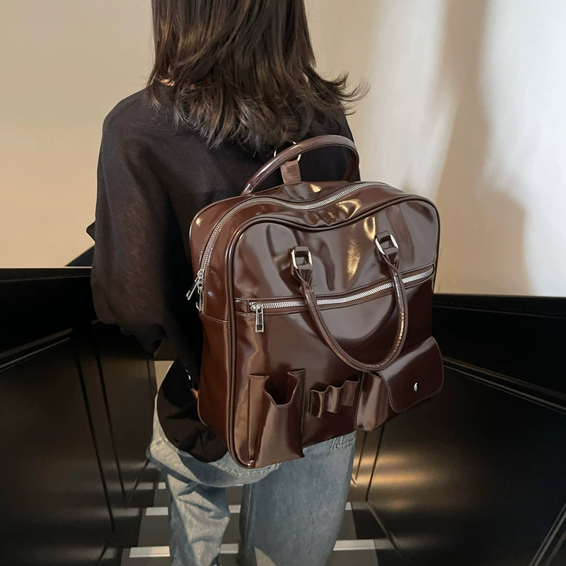 Capacious backpack, handheld bag, trend of season