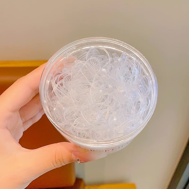 El cabello del bebé está atado, la banda elástica alta, la banda elástica desechable, la trompeta de color para niños no daña el cabello, la banda elástica pequeña