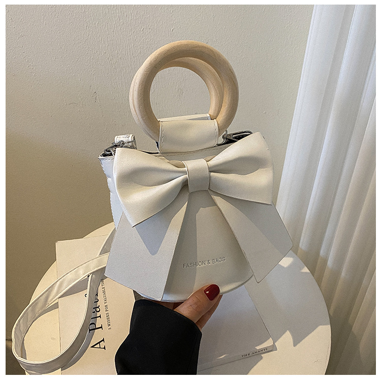 455g Weight Synthetic Leather Lining Material Sewing Thread Fashion Element Magnetic Buckle Closure Type Single Shoulder Strap, Double Handle Strap Type Bucket Bag Bags Type Casual Occasion Pu Leather Material Bow Knot Pattern All Seasons Season Women's Gender Elegant Style Bucket Shape Small Size Women's Small Pu Leather Bow Knot Elegant Sewing Thread Bucket Magnetic Buckle Bucket Bag 37