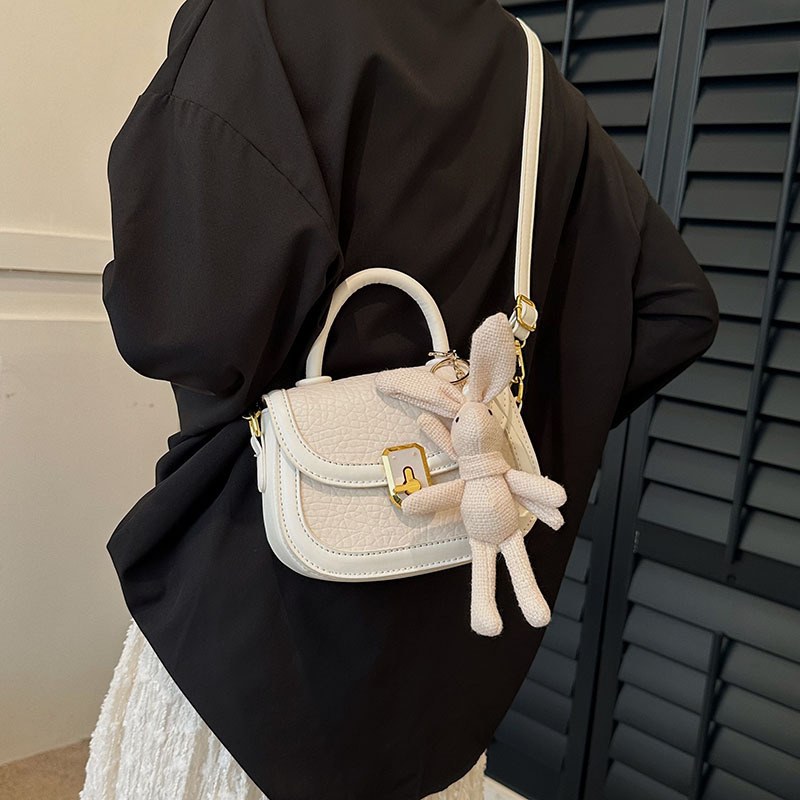 Sensación de alta gama patrón de piedra moda moda portátil pequeño bolso cuadrado femenino 2025 nuevo bolso de mensajero de hombro casual simple y versátil