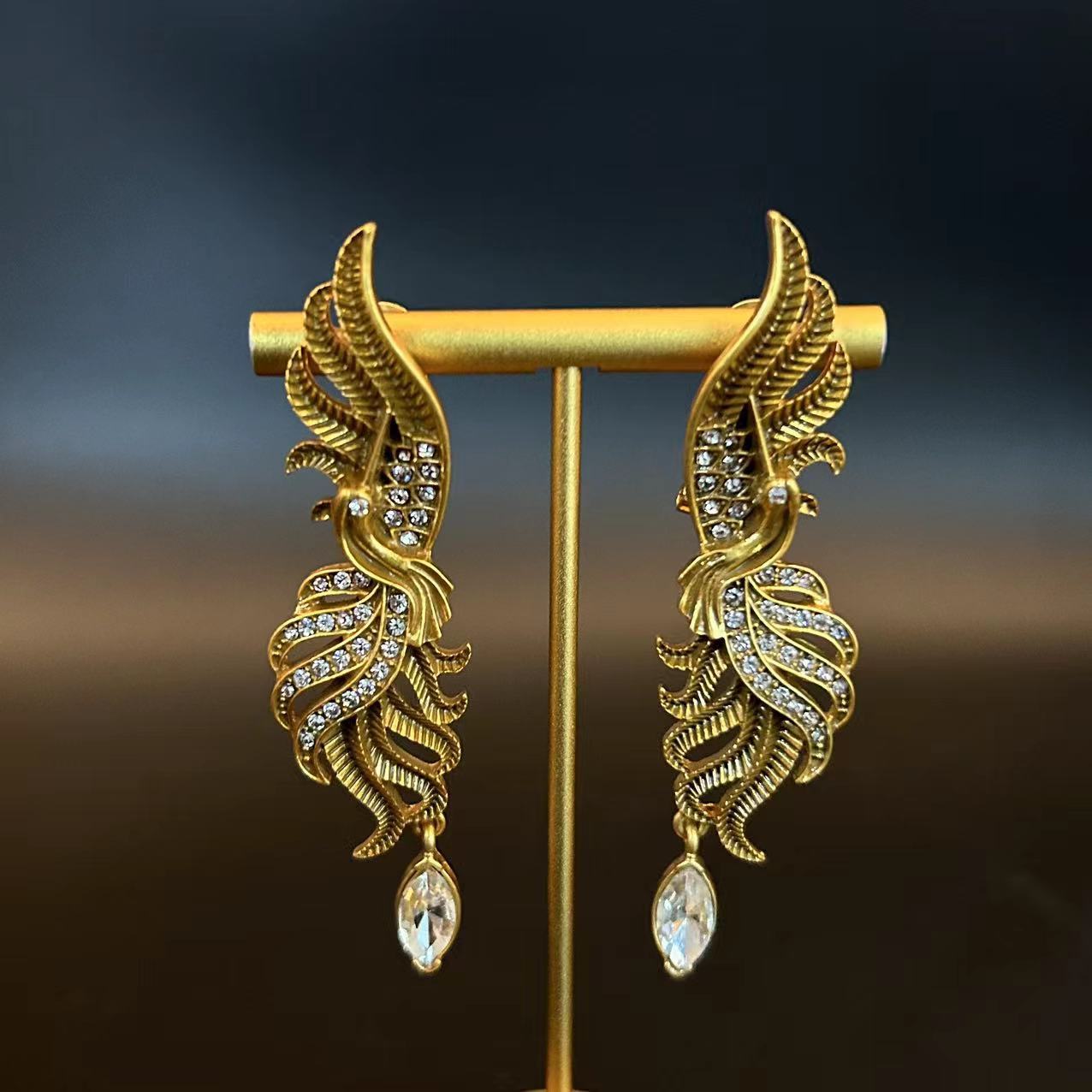 Set gioielli vintage collana e orecchini fenice con diamanti_voghion.com
