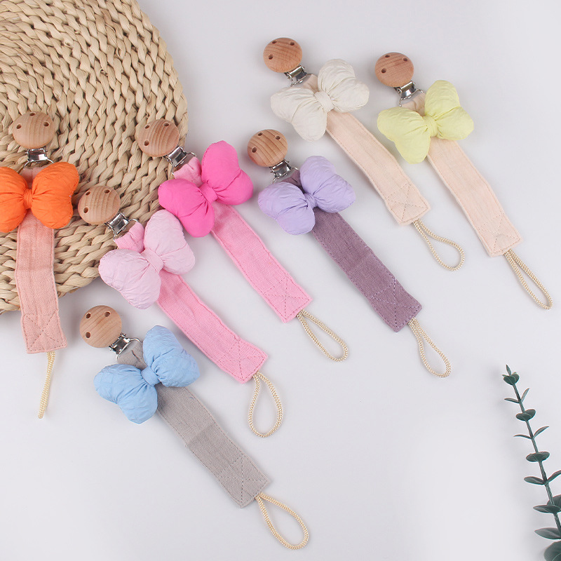 New baby products beech wood pacifier clip cartoon bow cotton and linen ribbon pacifier rope baby pacifier chain