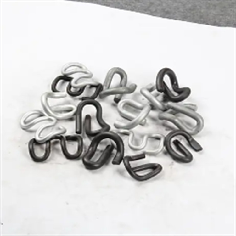 Fijación de tira elástica de ferrocarril industrial y minero, placa de presión de tira elástica de ferrocarril de acero al carbono tipo E de servicio pesado, fijación de tira elástica