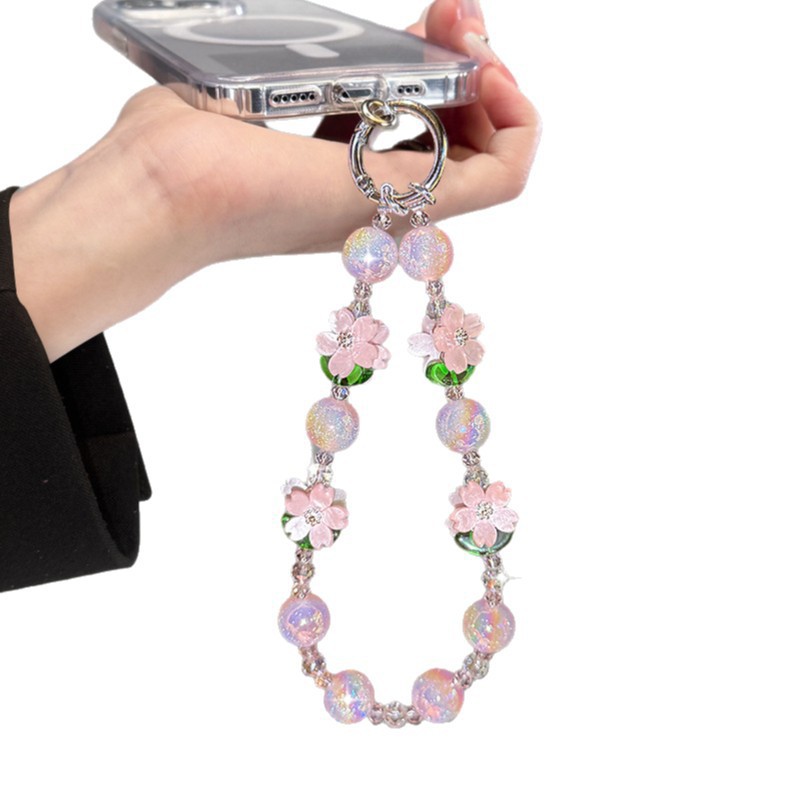 Flor de melocotón brillante cadena de teléfono móvil ligera de lujo de alto nivel colgante de cristal de moda anti-caída colgante de mano perlas para mujeres