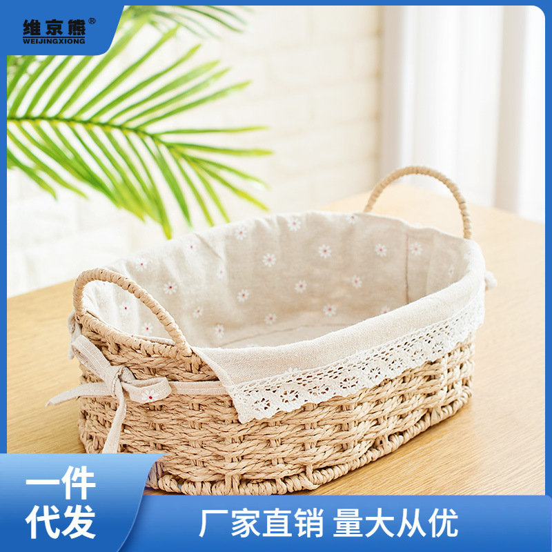 Hand-woven straw desktop remote control storage basket for creative organization—perfect for storing small items, hair accessories, and handmade woven fabric crafts like ginger tea containers.