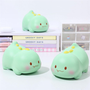 Ring finger XMB-1330025 lying dinosaur slow rebound doll children's decompression toy pinch music desktop decoration