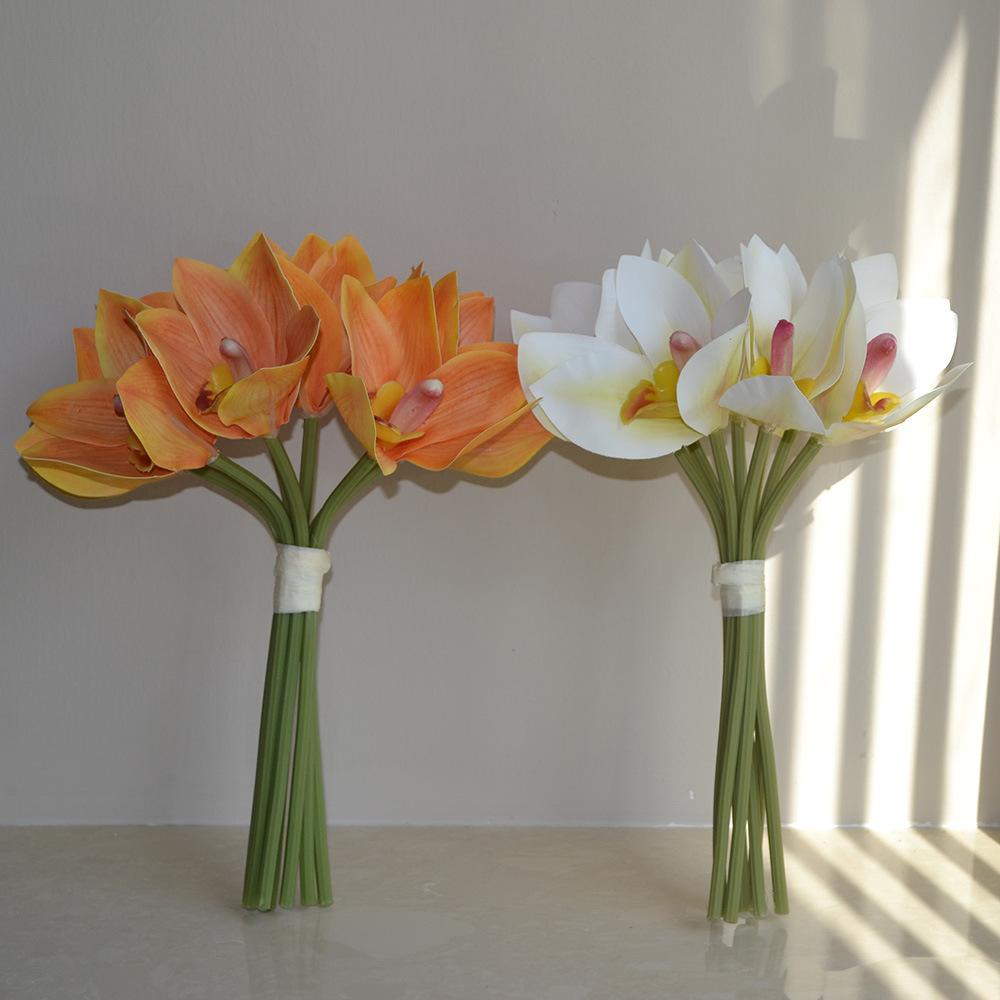 cymbidiums with bunches and flowers in hand, home model room decoration, dining table and coffee table decorations, fake flowers_voghion.com