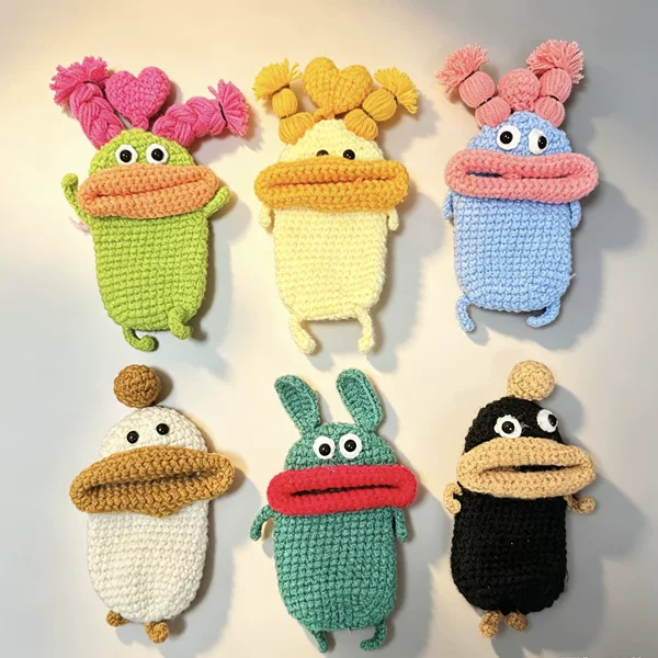 Finished product cross-border hot seller: Cute and quirky sausage mouth key case, hand-woven pull-out cartoon car key protector