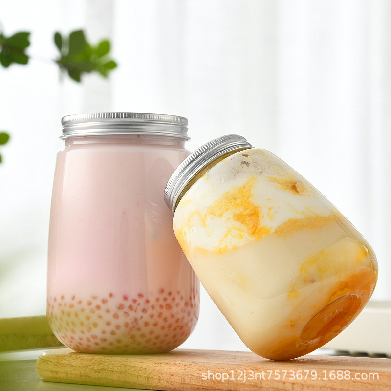 En stock Botella de plástico en forma de U Botella de bebida de jugo de mascota transparente 500ml Botella de té de leche desechable de grado alimenticio al por mayor