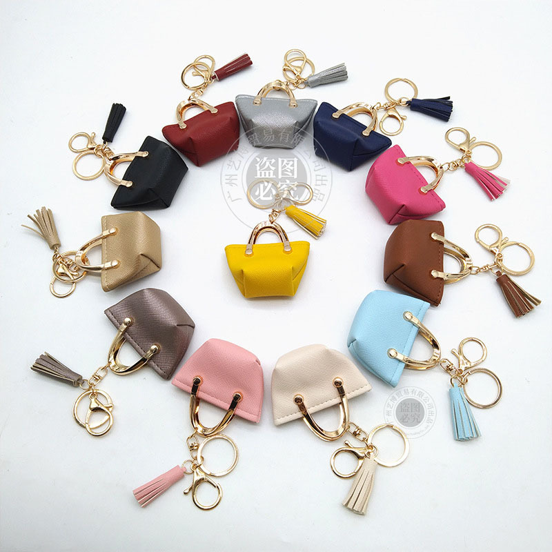 Llavero para mujer, bolso, colgante, joyería, mini monedero de almacenamiento de cuero lindo europeo y americano