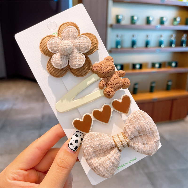 La horquilla de la niña no duele el cabello El tocado de horquilla para niños Otoño e Invierno leche La Cabeza trasera de la niña marrón pelo roto clip de acabado