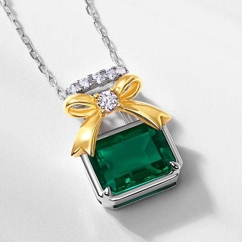 Collar colgante de botella de perfume de lujo ligero francés de nuevo estilo de verano transfronterizo S925 con incrustaciones de plata para cultivar cadena de clavícula de esmeralda