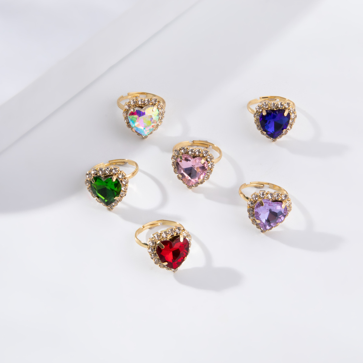 New Fashion Small Heart-shaped Ring Personality Alloy Diamond Color Peach Heart Ring display picture 2