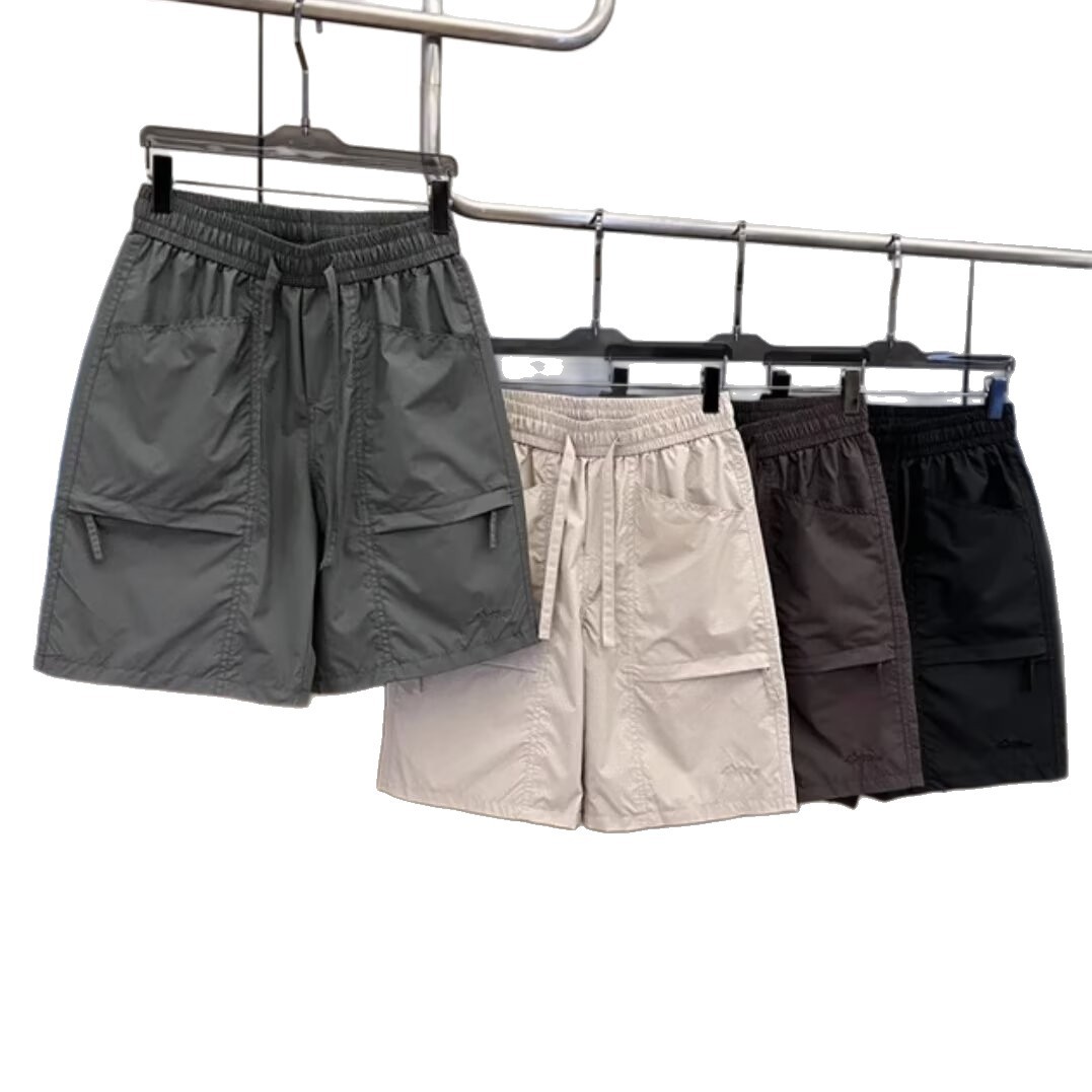 Popular Simple Summer Laser Perforated Tooling Shorts Large Pocket Breathable Mesh Pants Loose Sports Pants
