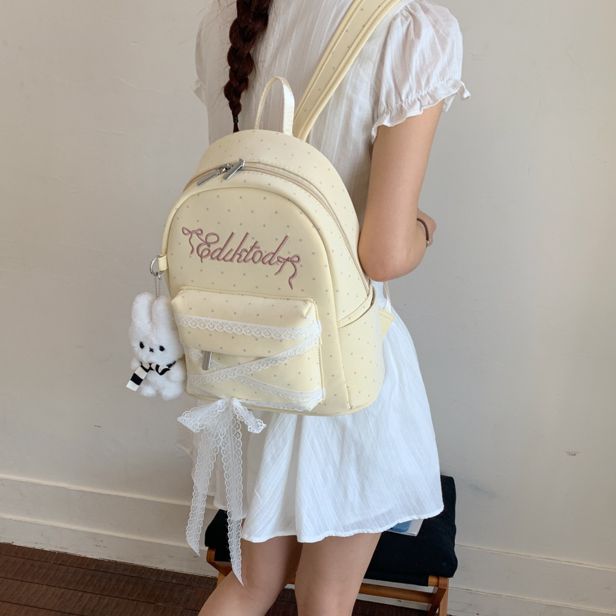 Mochila de letras onduladas para mujeres 2026 nuevo arco de encaje dulce mochila diaria mochila de verano ligera