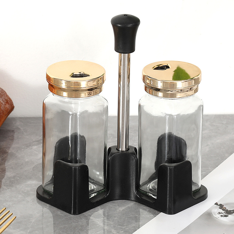Botella de condimento de vidrio de cocina ligera de lujo al por mayor humedad lata de sal condimento lata de botella de sal