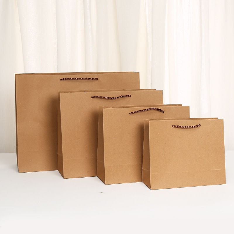 外卖广告服装购物新年礼品包装袋牛皮纸袋批发230克本色卡纸袋