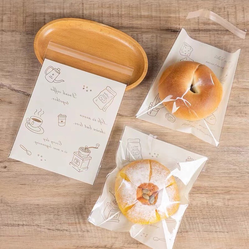Bread packaging bag self-sealing sticky bagels toast donut biscuit bag baking transparent packaging packaging small separate Bread packaging bag self-sealing sticky bagels toast donut biscuit bag baking transparent packaging packaging small separate