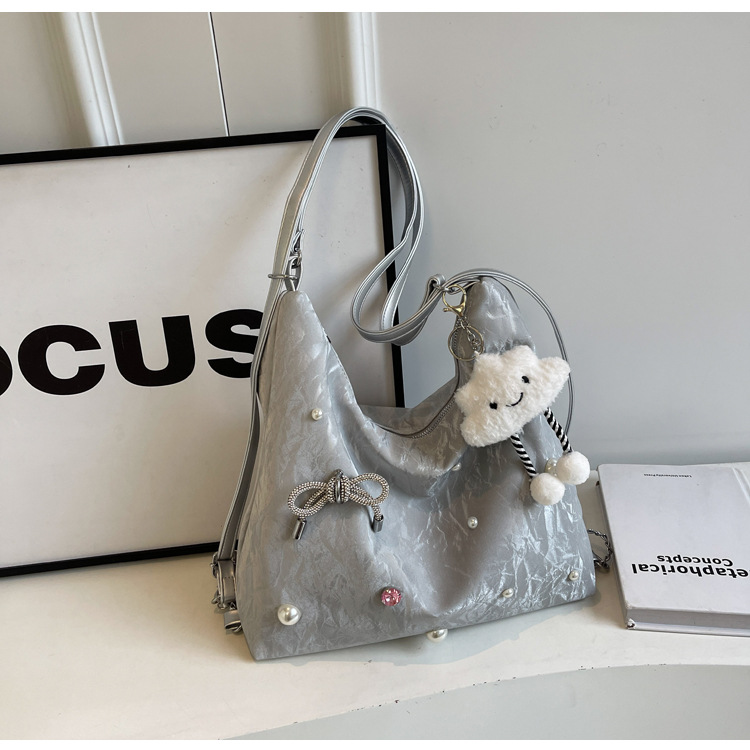 Bolsa de gran capacidad para mujeres 2024 nuevo nicho de alto nivel de diseño de diamantes de viaje multifuncional mochila de doble hombro inclinada