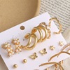 Metal earrings from pearl, set, fashionable advanced accessory, suitable for import, punk style, high-quality style