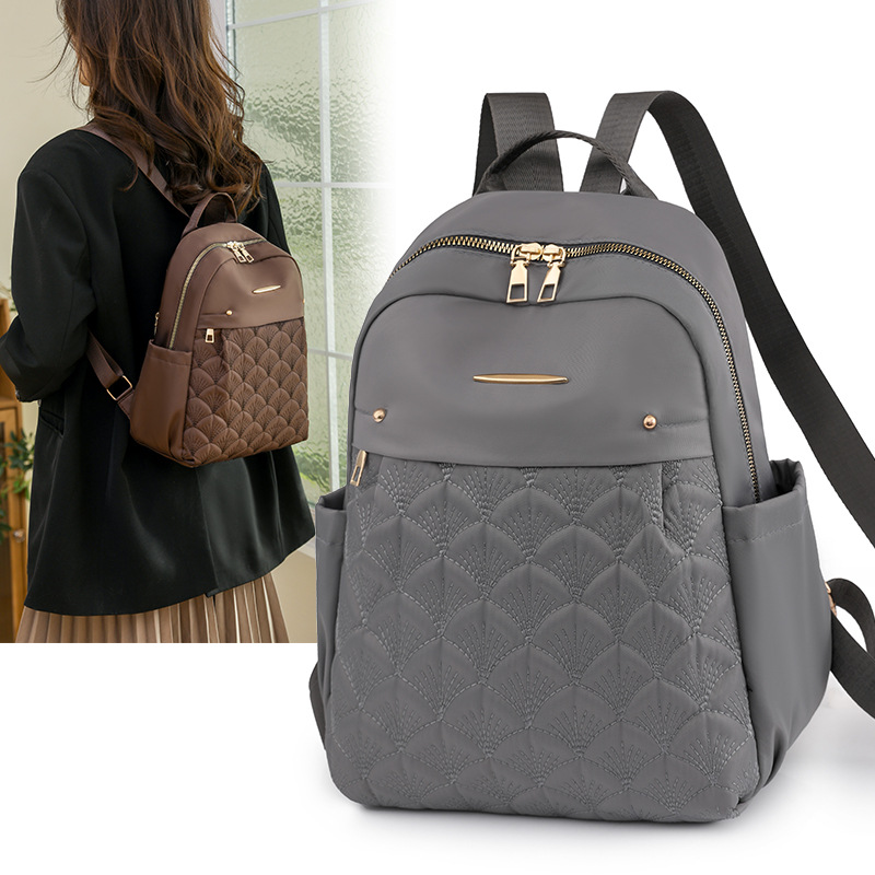 Transfronterizo al por mayor 2023 nueva mochila de nailon casual para mujer, mochila de viaje de gran capacidad literaria simple, mochila escolar