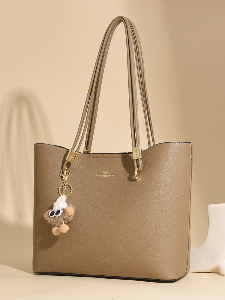 Nueva moda de mujer atmósfera bolso de mujer para enviar a la madre un paquete de hombro grande, envío gratuito.