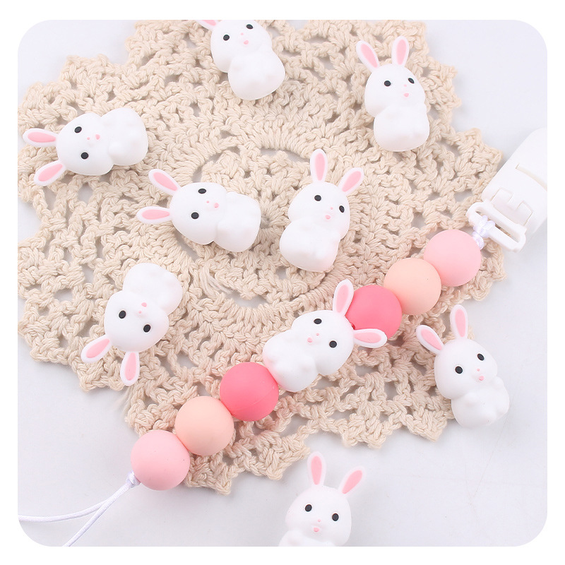 Productos creativos para bebés DIY dibujos animados silicona estereoscópica conejo blanco diente bebé molar tetina cadena accesorios de diente