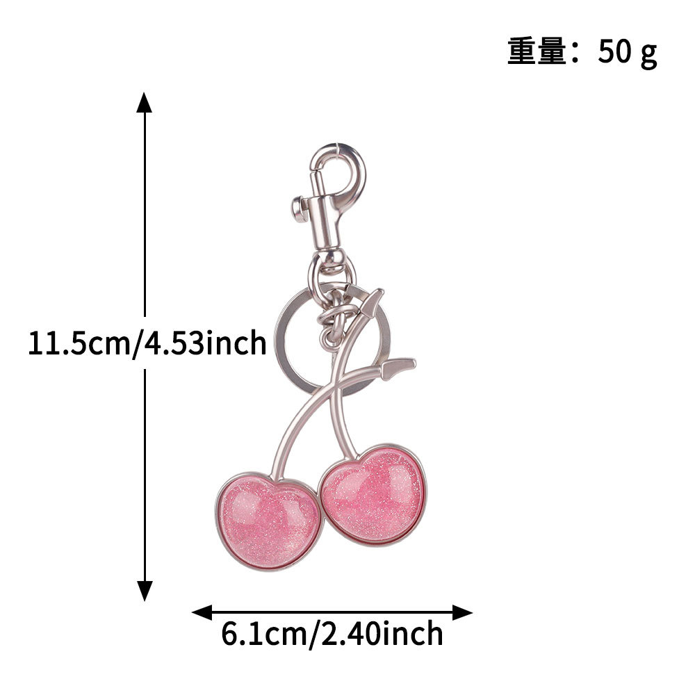 Transfronterizos directamente para bolsas de cereza colgantes de moda llaveras de automóviles llaveras de Amazon llaveras de metal accesorios de bolsas al por mayor