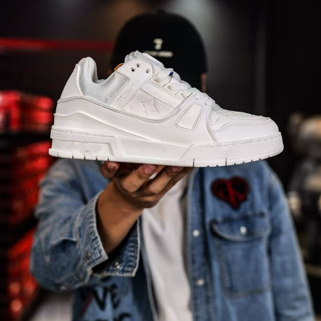 2025 lujo ligero L nicho marca de moda V caucho vacío cabeza de cuero zapatos de hombre deportivos casuales versátiles zapatos de mujer skate cross-border