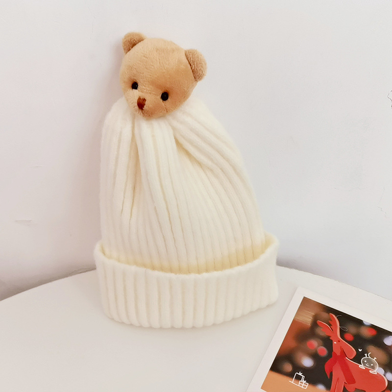 Milky white-khaki bear