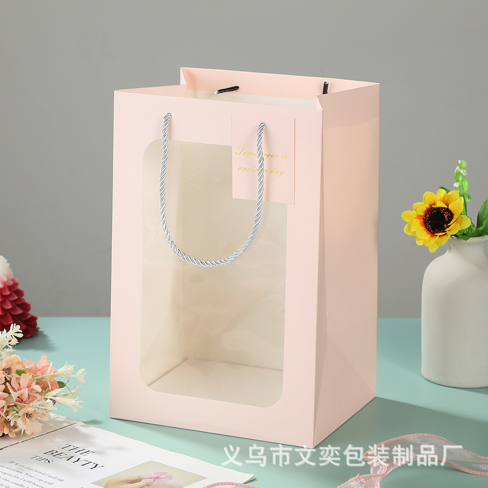 Bolsa de regalo transparente al por mayor de fábrica Bolsa de regalo de flores del festival Qixi Bolsa de regalo de regalo de ventana abierta Bolsa de regalo portátil