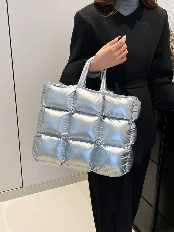 Glossy nylon quilted handheld shoulder bag with down