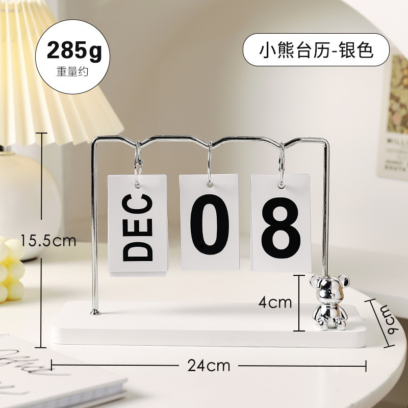 Calendario del oso - adornos blancos y plateados