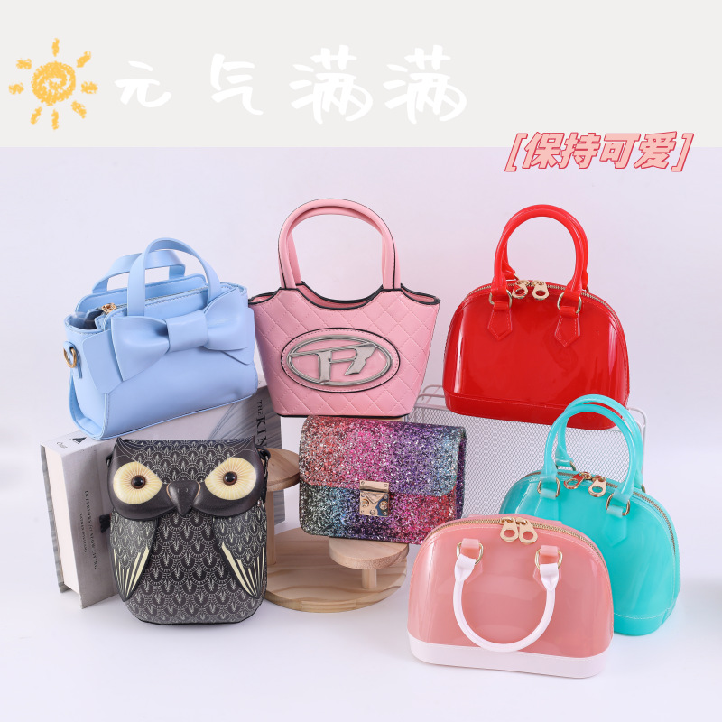 2025 primavera y verano estilo caliente moda casual niños dulces bolsa de gelatina mini bolso de mensajero de un solo hombro variedad al por mayor