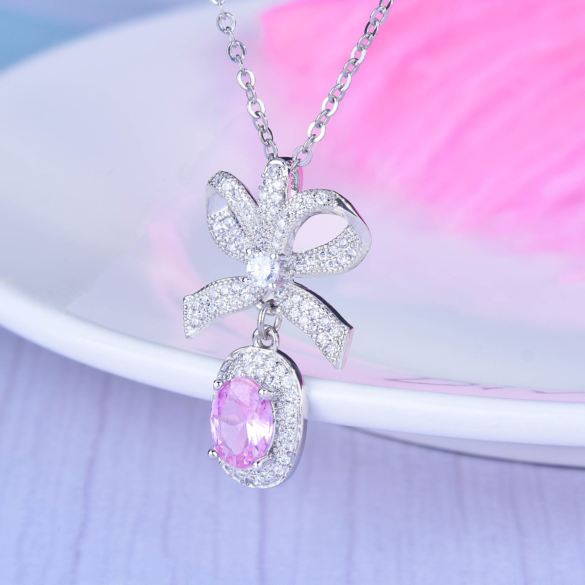 fashion three-dimensional pink diamond bow pendant copper necklace