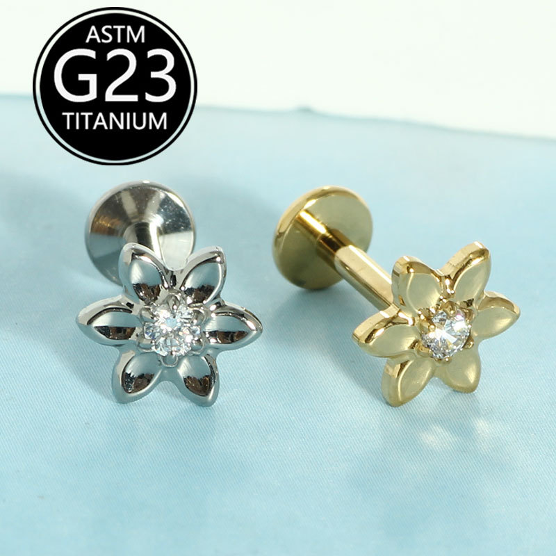 Silver pointed spike labret stud material detail