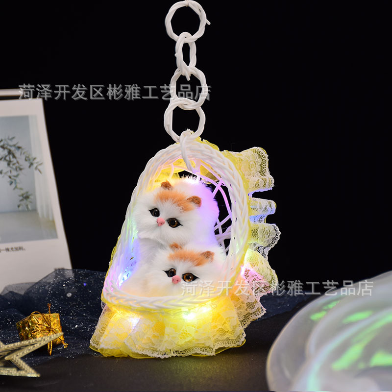 Cestas luminosas con lámparas y llamadas gatitos, simulación de gatos, juguetes luminosos para niños, estandos, puntos de venta.